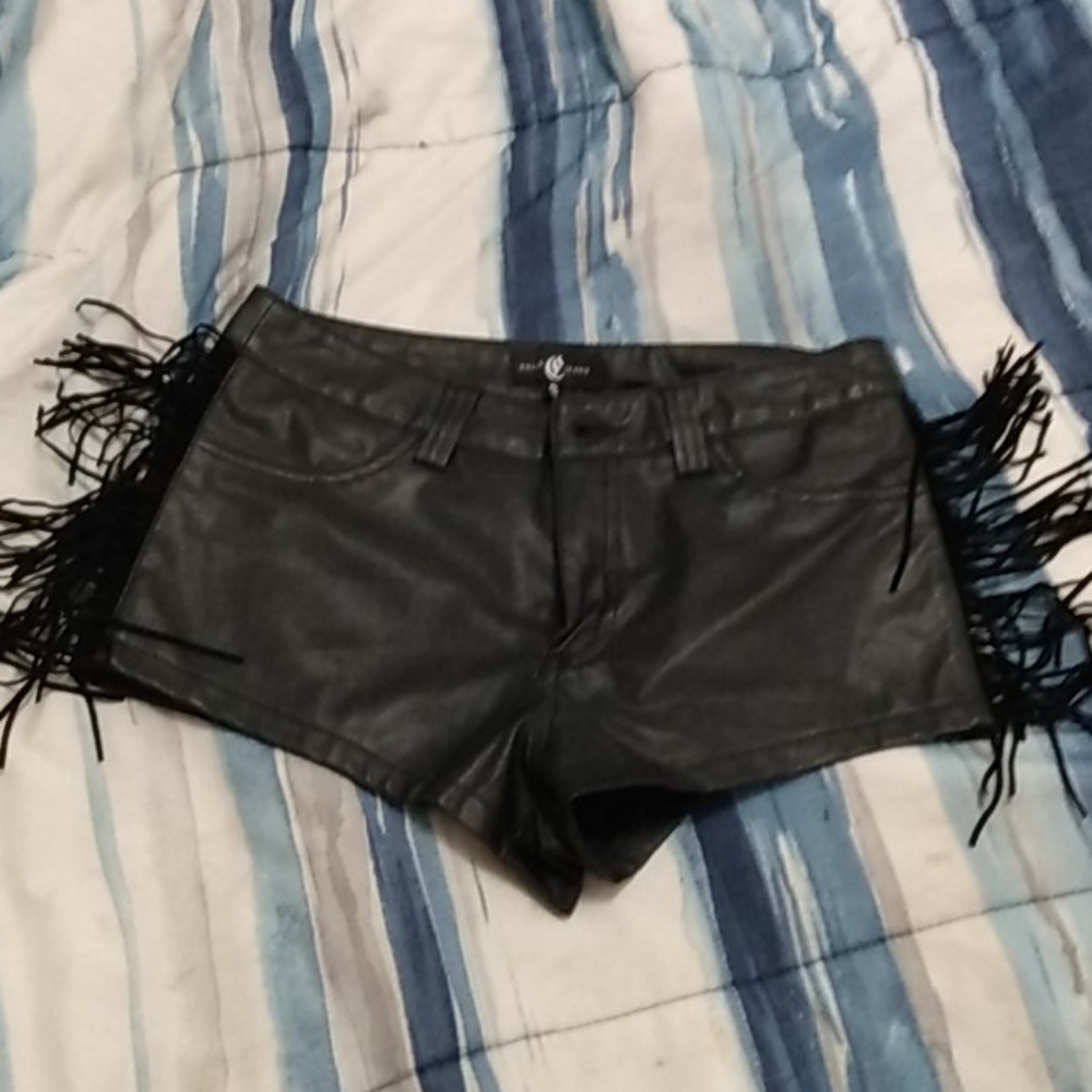 Cute fake leather shorts with tassels on the side